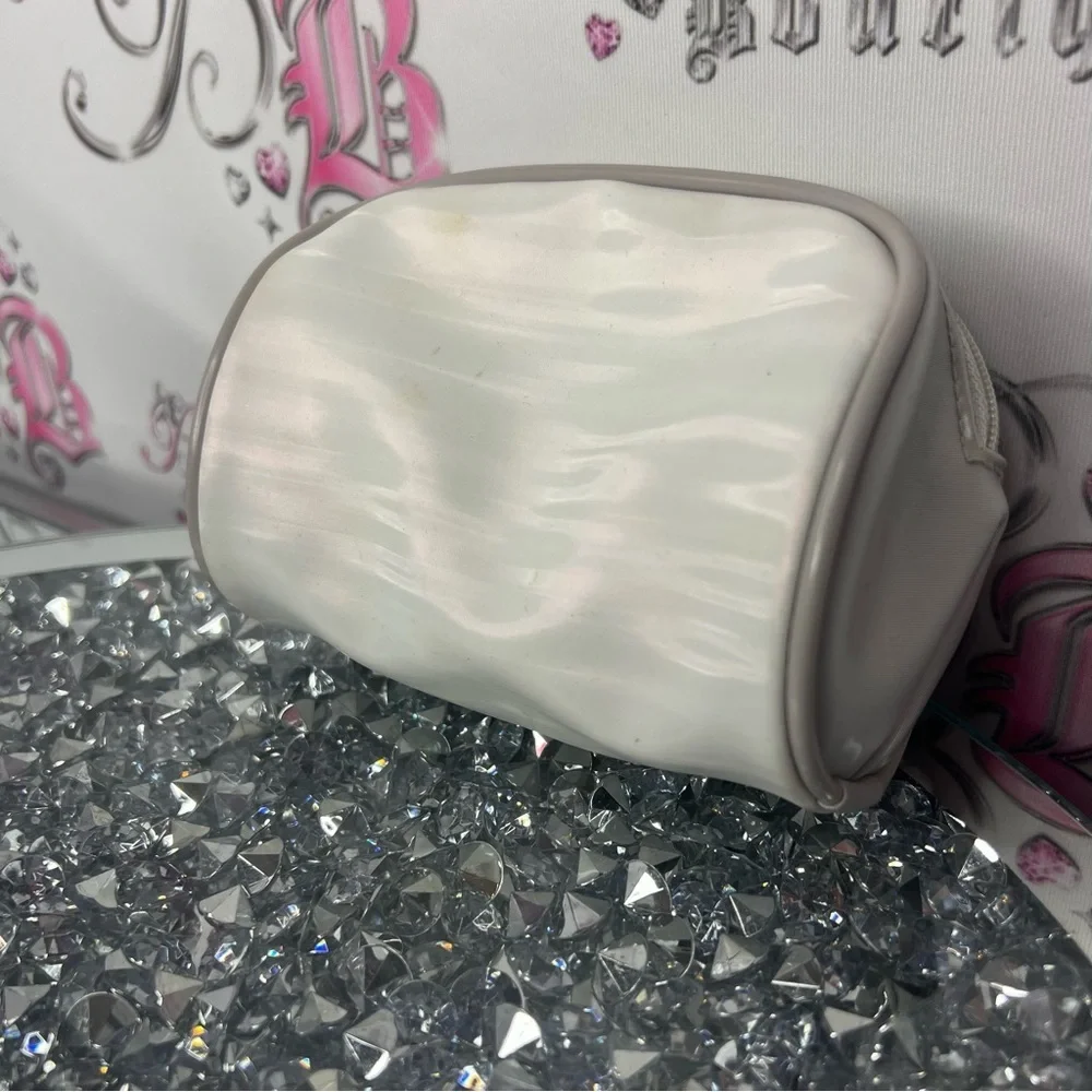 Christian dior makeup bag small white stripe shimmer pattern grey gold hardware